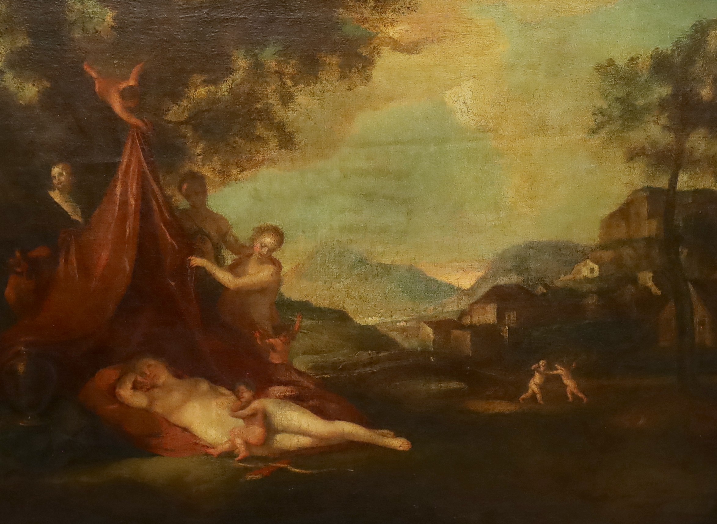 18th century Italian School, Venus sleeping in an Italianate landscape with attendants, oil on canvas, 54 x 71cm